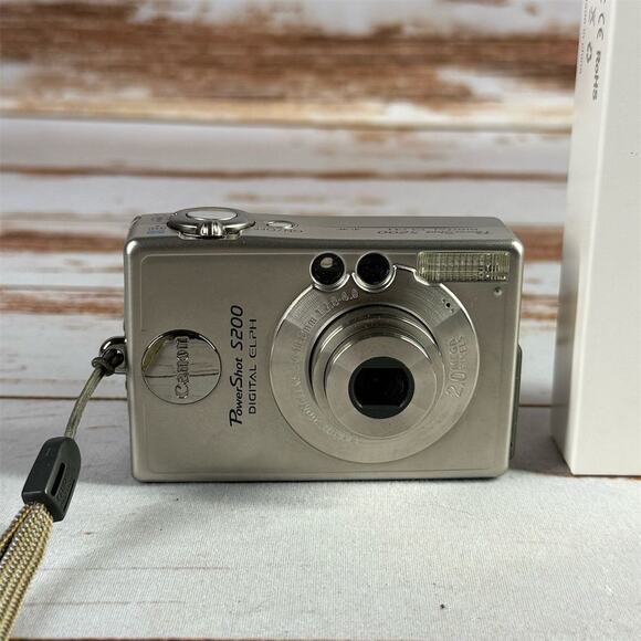 Canon PowerShot S200 Digital ELPH Camera Silver + Battery & Charger Parts - Picture 2 of 7